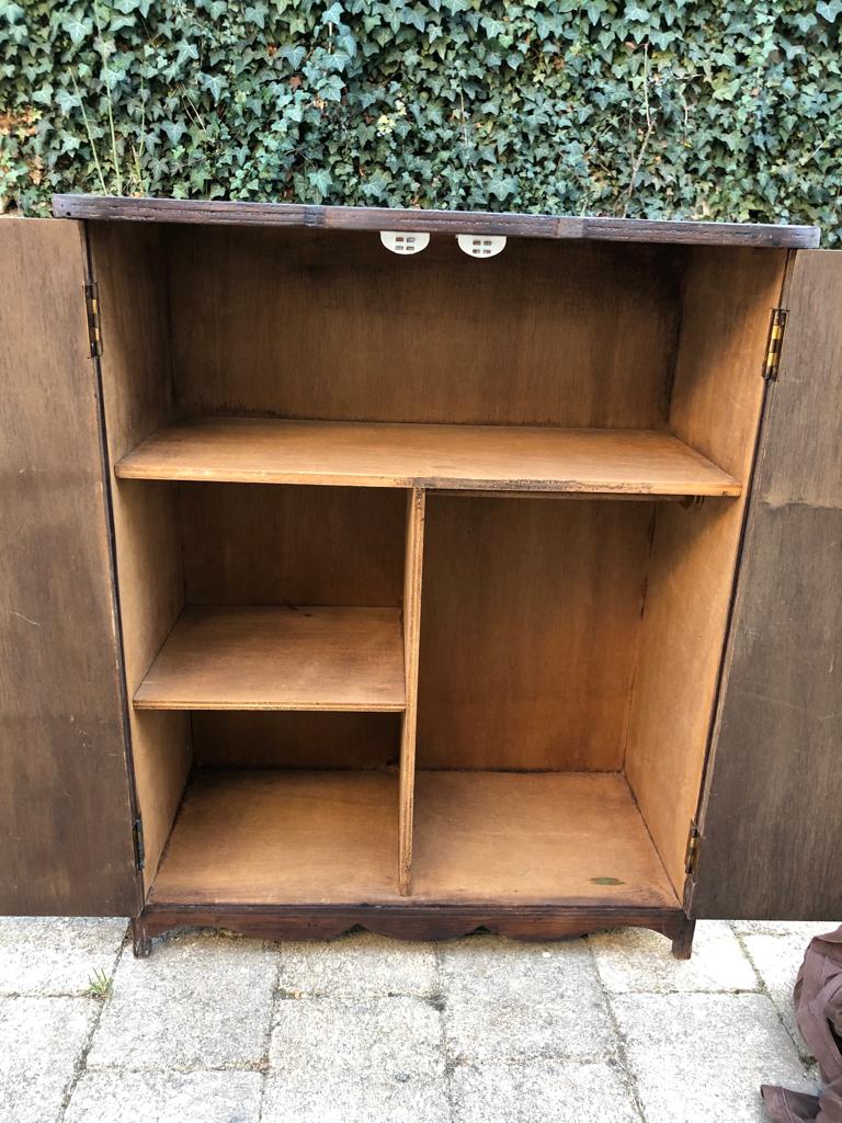 Small wardrobe made of doll wood or children's bedside