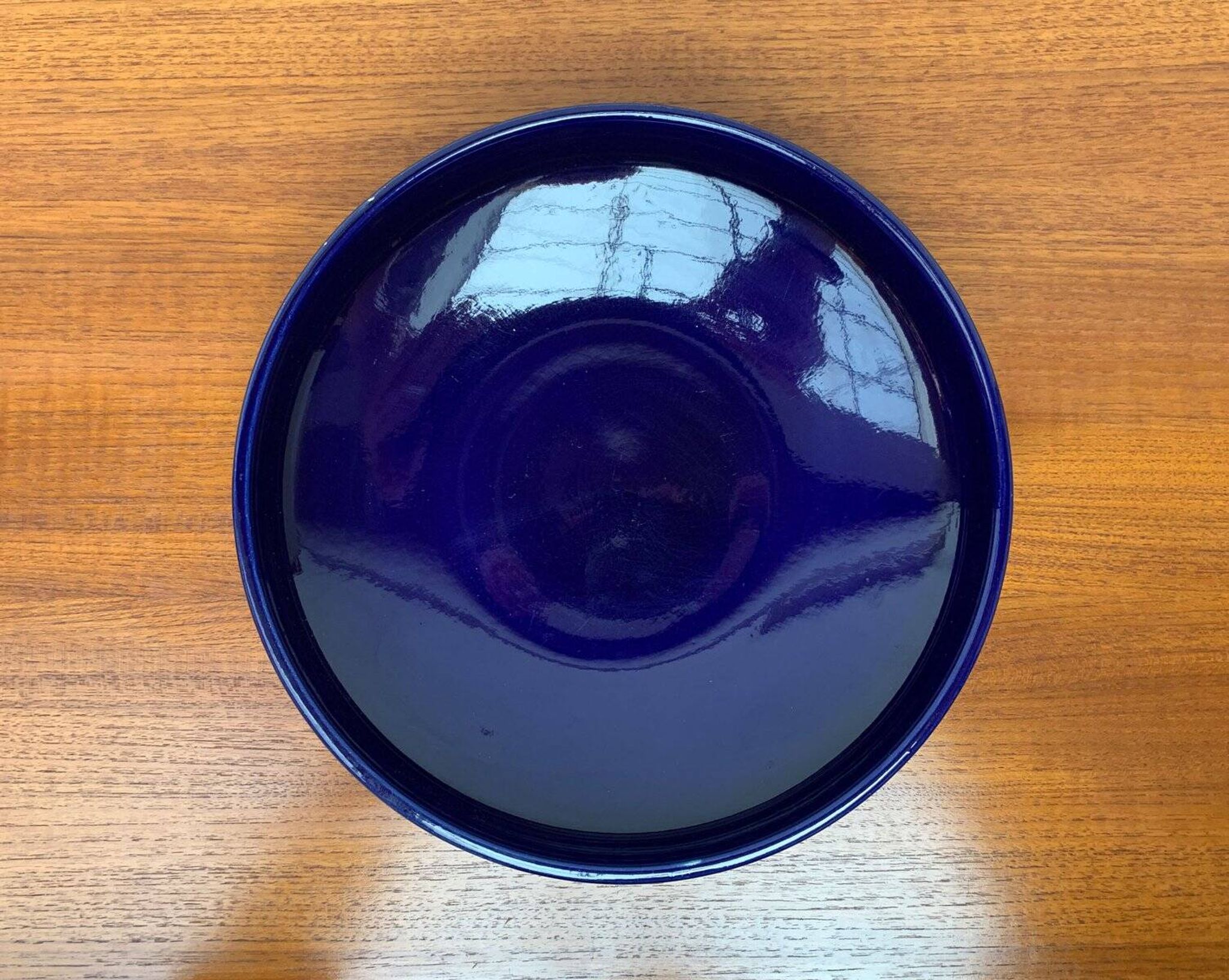 Dark blue pottery bowl from West Germany from the mid-century, 1960s.