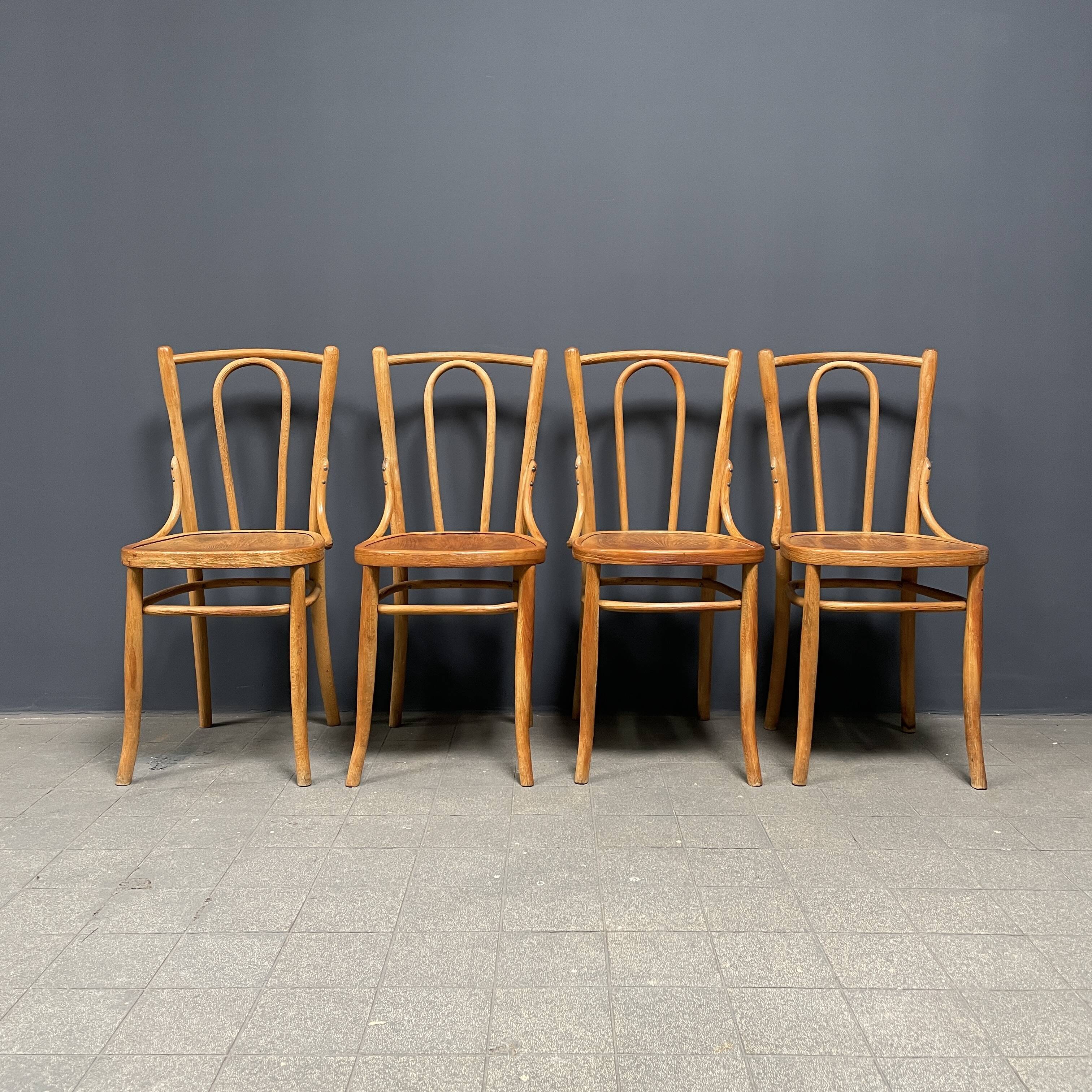 Set of 4 wooden bistro chairs with graceful seats