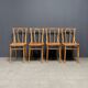 Set of 4 wooden bistro chairs with graceful seats