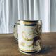 Pair of stoneware beer mugs signed Keraluc, Quimper 1950