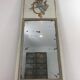 Louis XVI style mirror in patinated carved wood