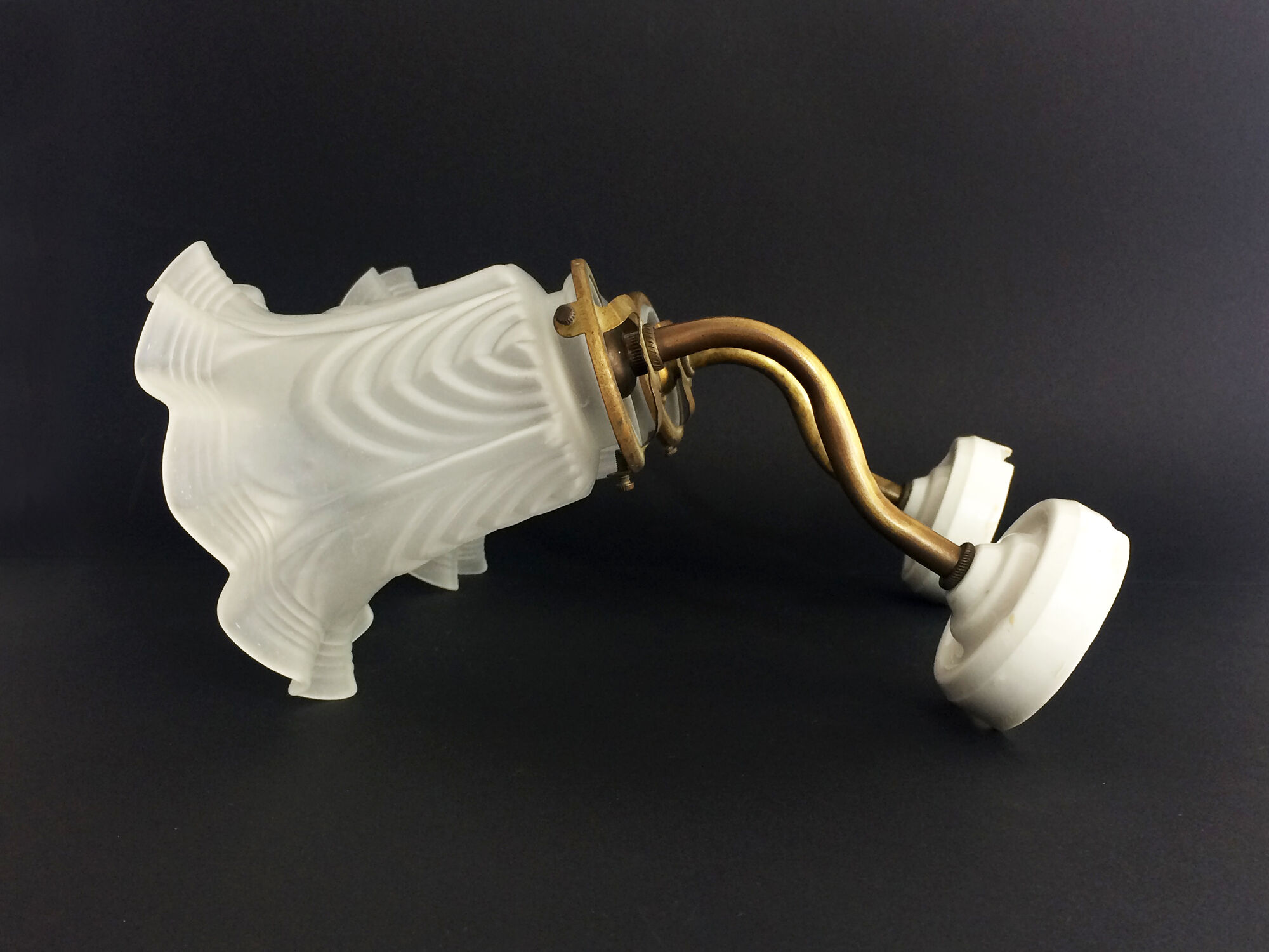 Pair of brass swan collar wall sconces, porcelain fastening. Vintage