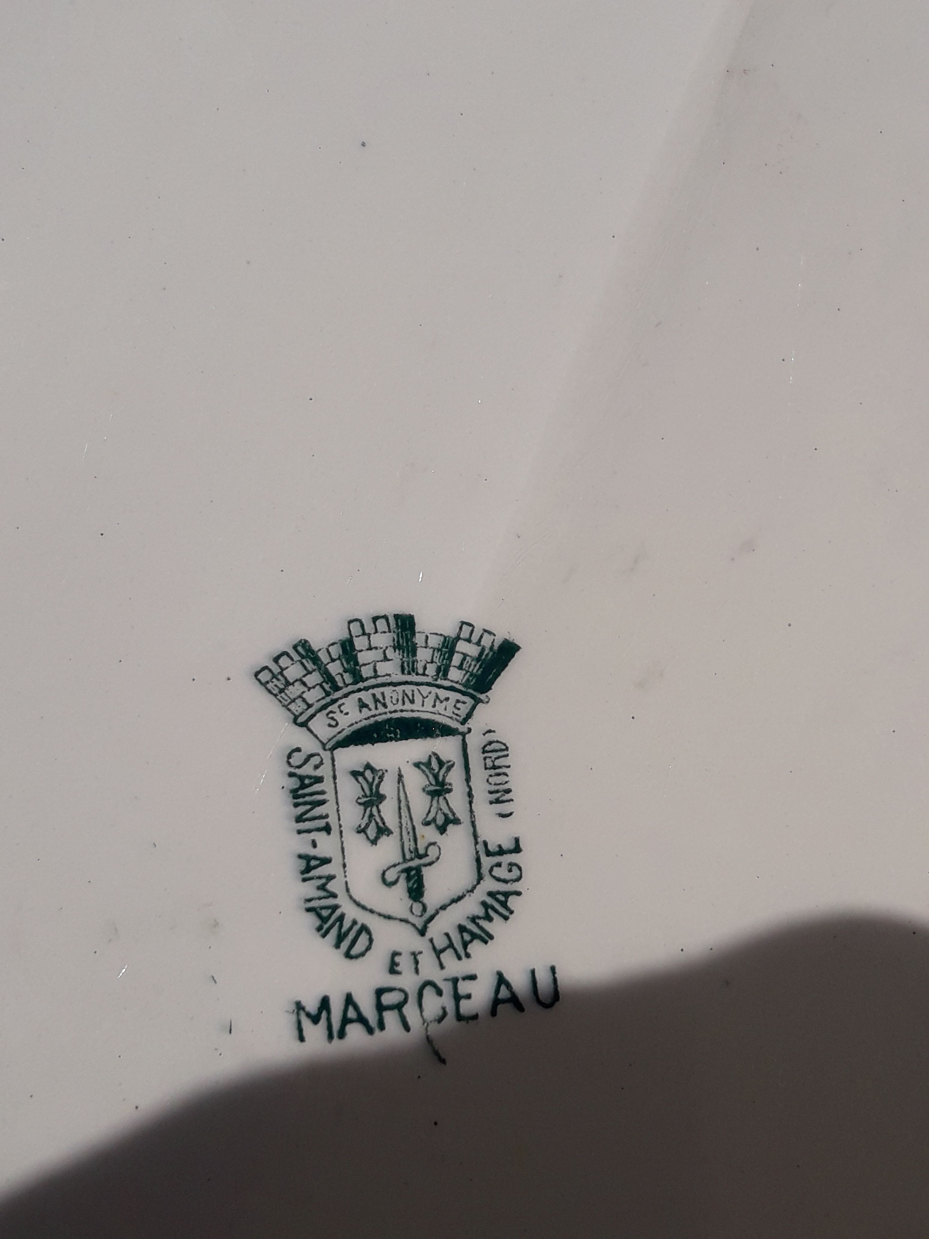 Oval plate in st. Amand earthenware and Hamage Iron Earth model Marceau L 33.5 cm