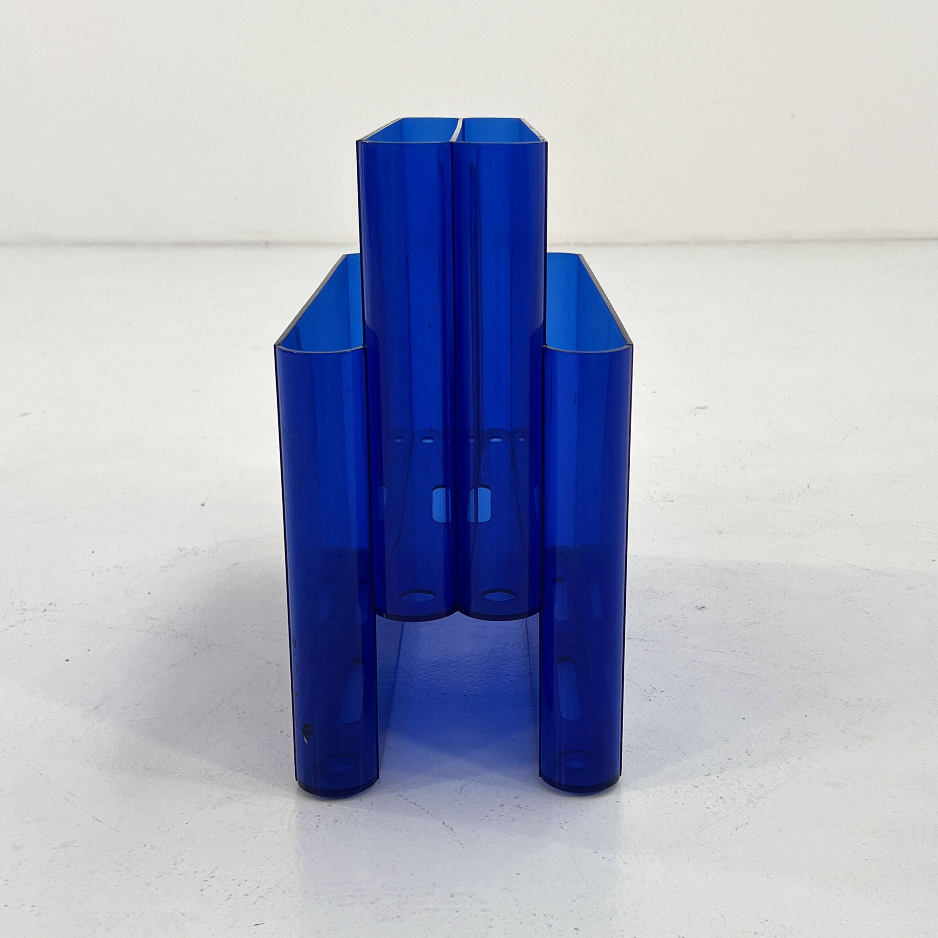 Blue transparent magazine rack by Giotto Stoppino for Kartell, 1970.