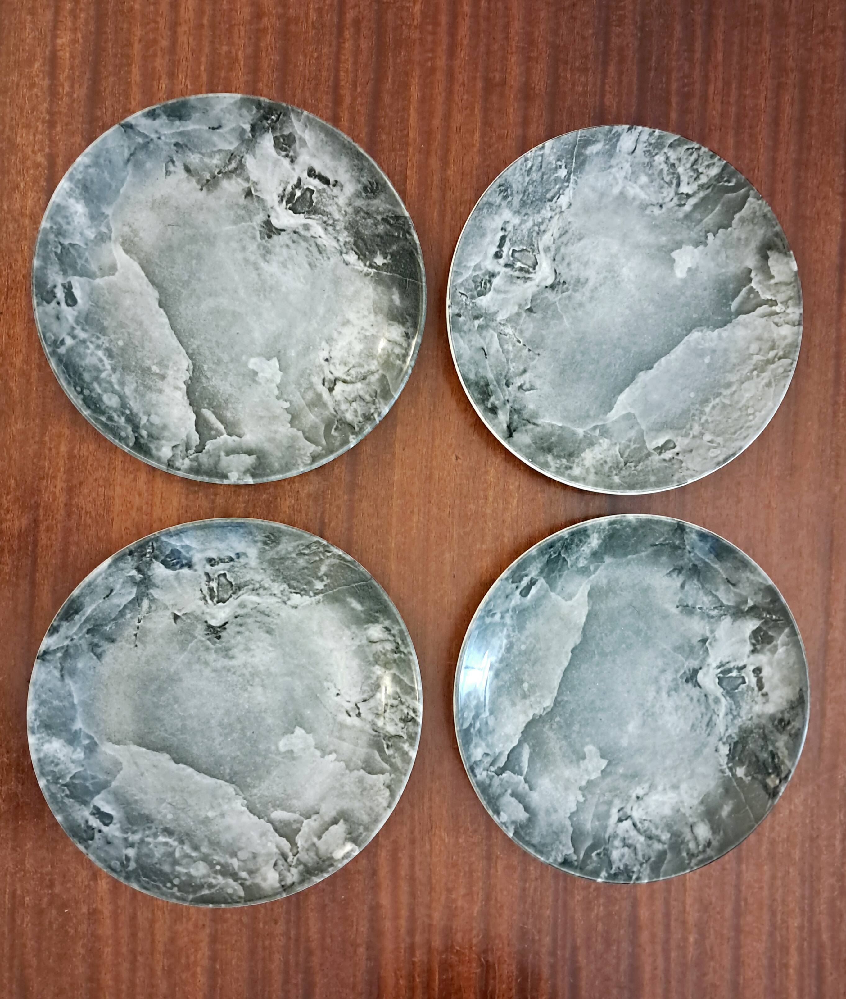 Four vintage marbled plates from Federated Potteries Staffordshire