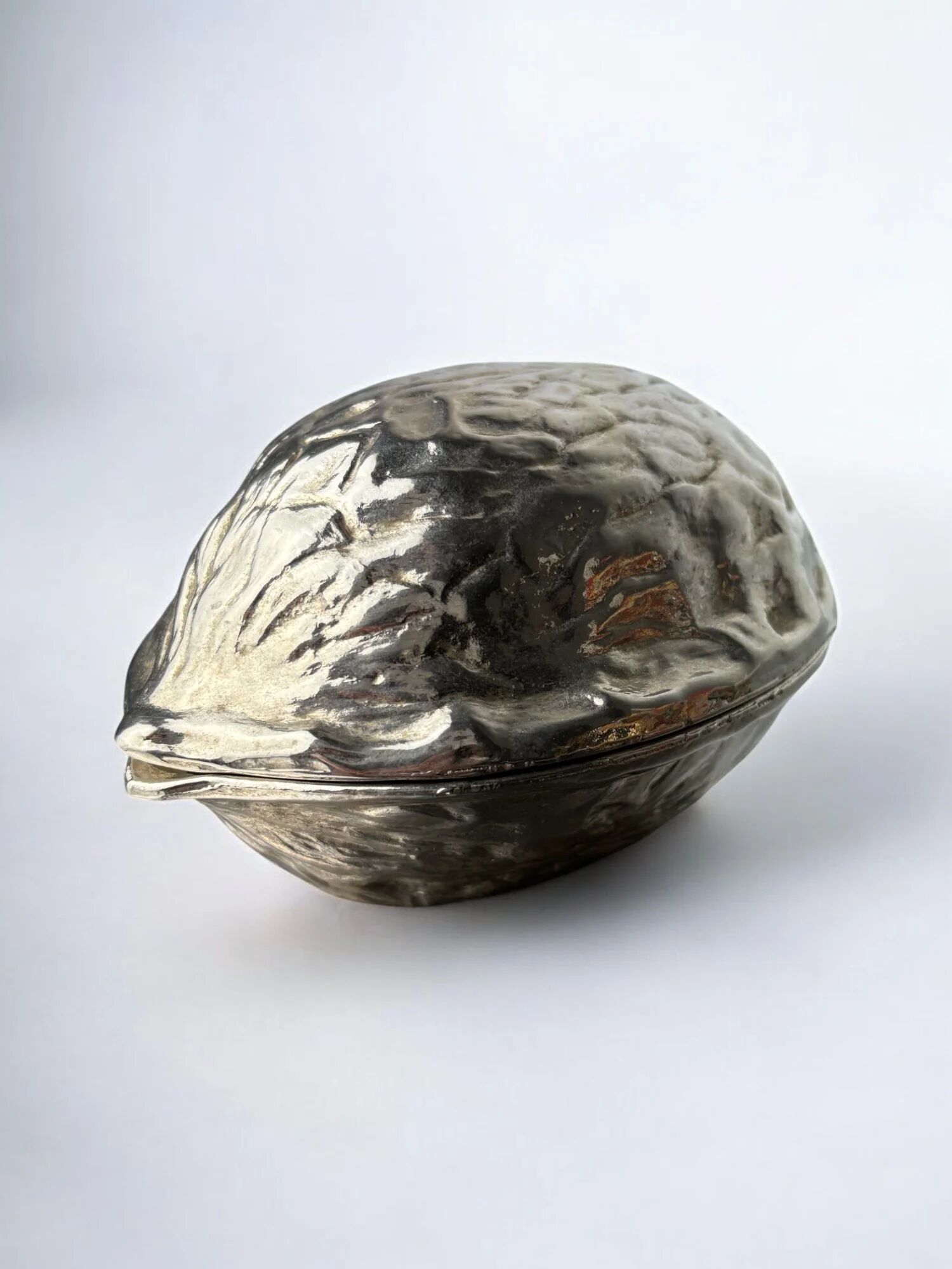 Silver plated walnut shaped nutcracker, Italy 1970s