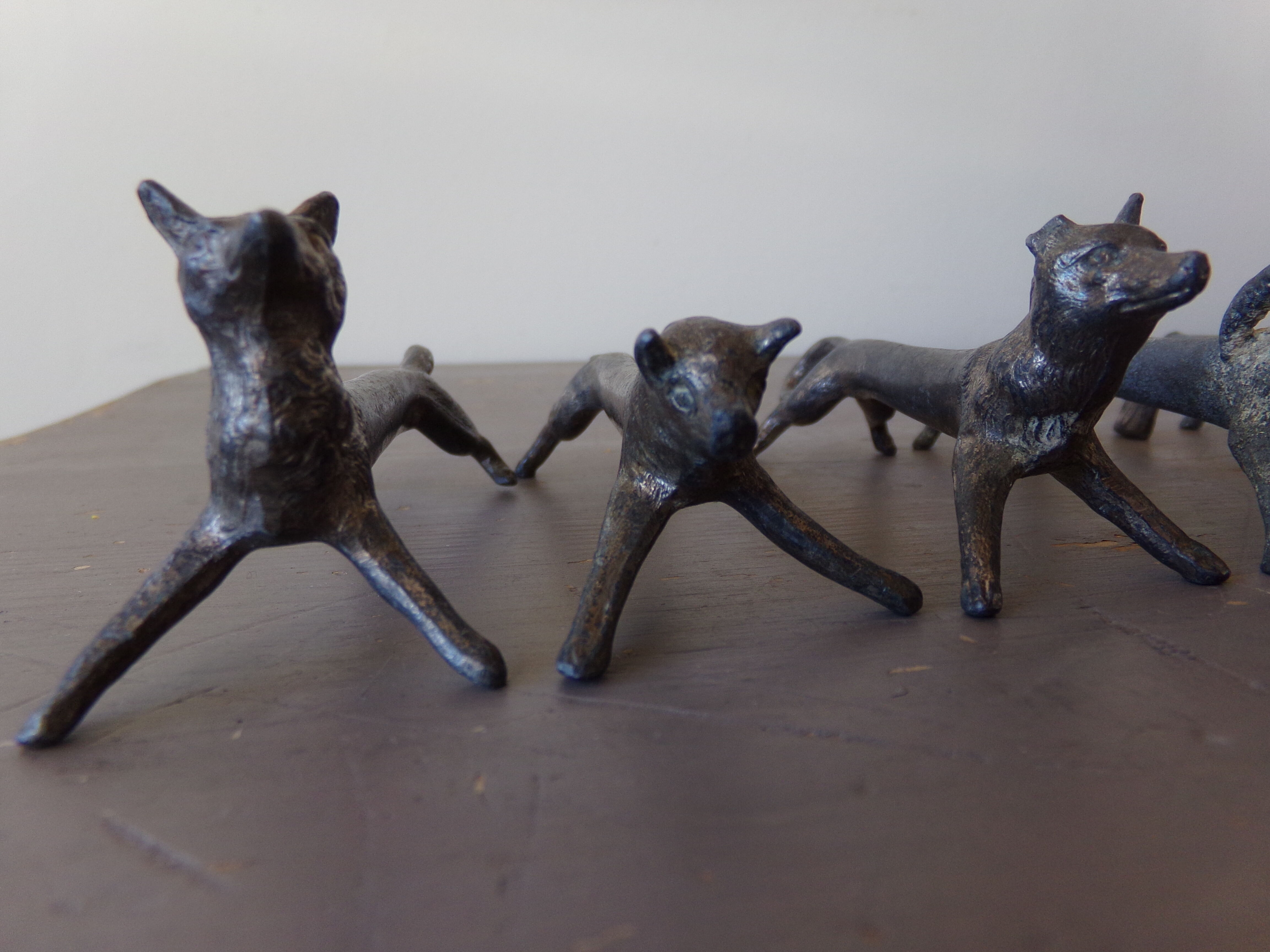 8 antique tin animal knife holders