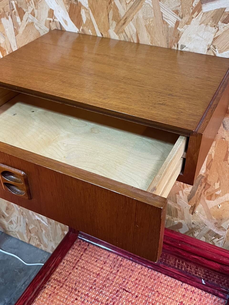 Suspended teak bedside tables in vintage 1960s Scandinavian style.