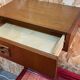 Suspended teak bedside tables in vintage 1960s Scandinavian style.