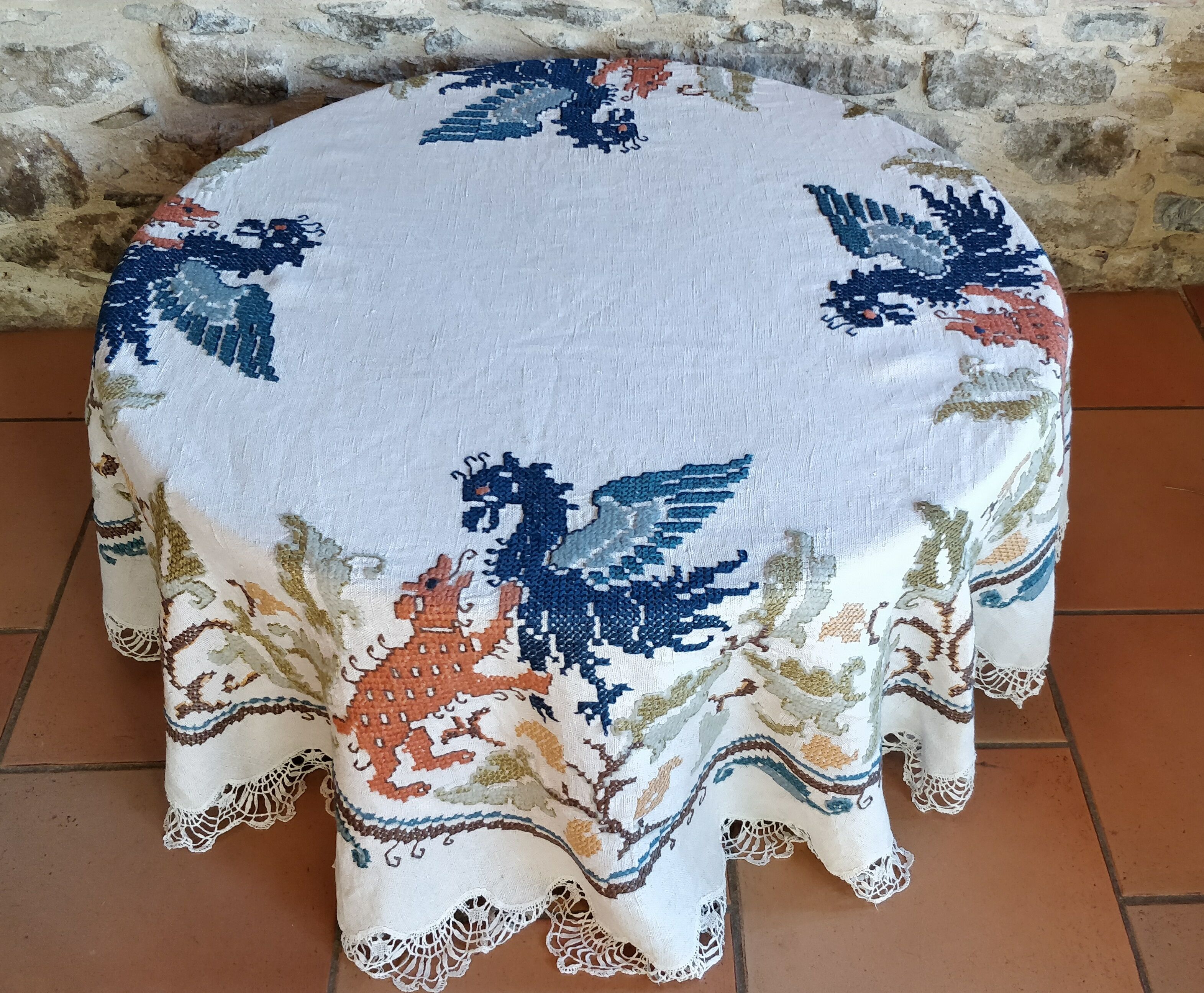 Round embroidered linen tablecloth