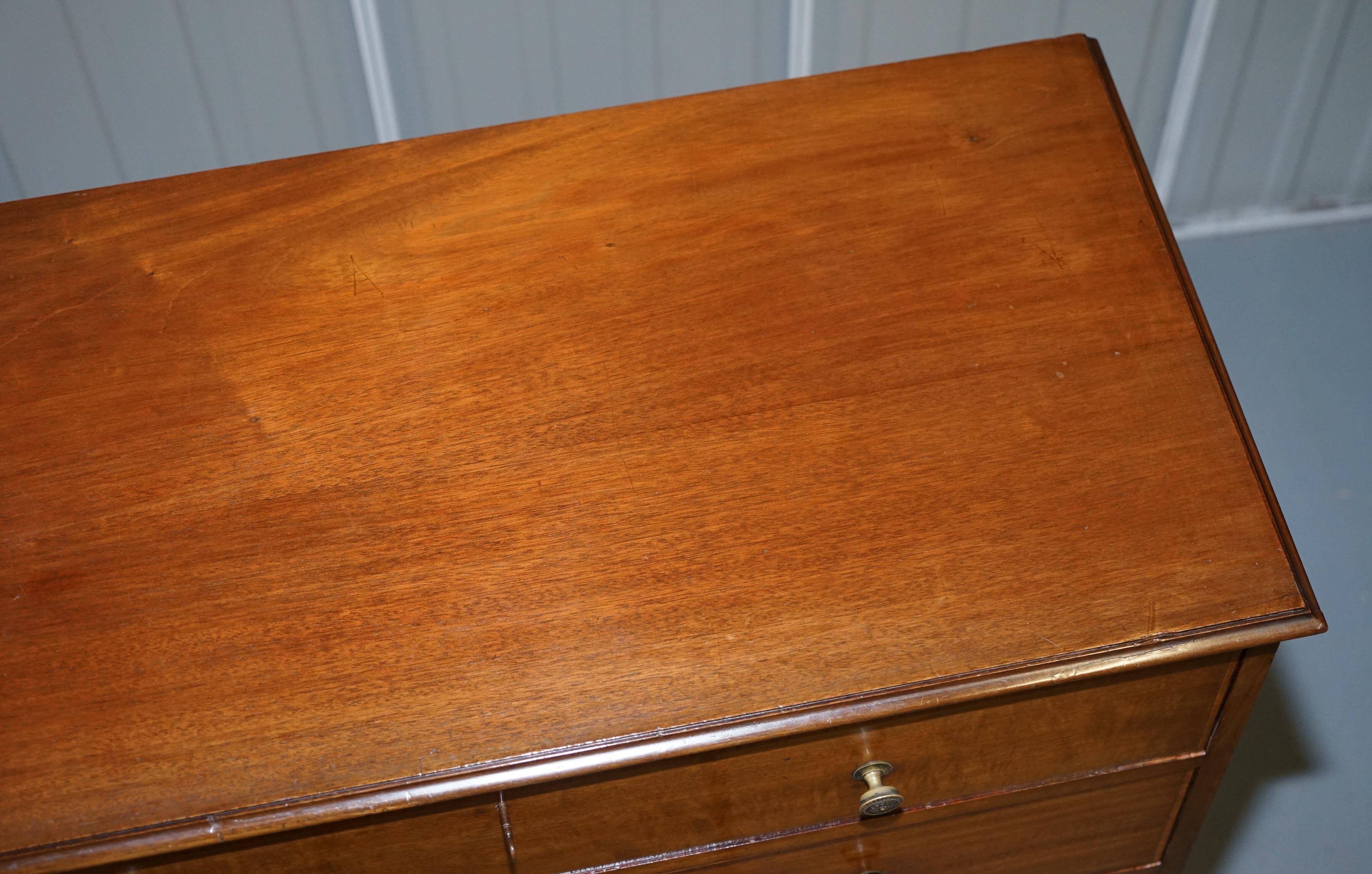 Victorian commode by Howard & Son with hidden cupboard.