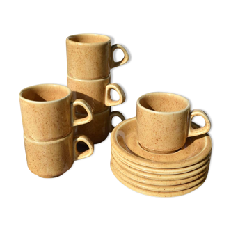 Series of 6 sandstone cups and saucers