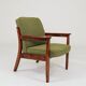 Fauteuil rétro en tissu boucle vert, forme ergonomique
