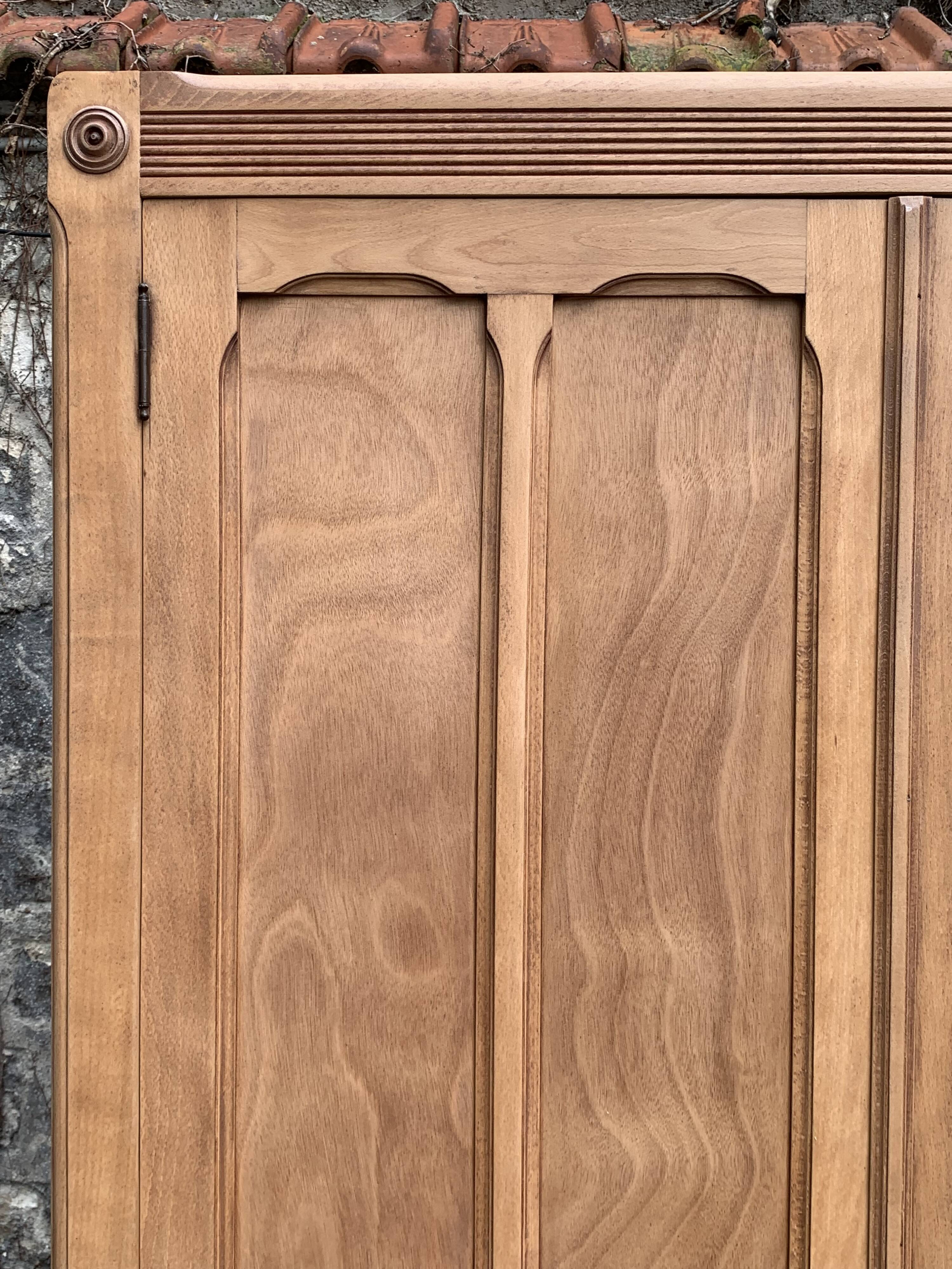 Parisian paneled cabinet in raw wood, 1940