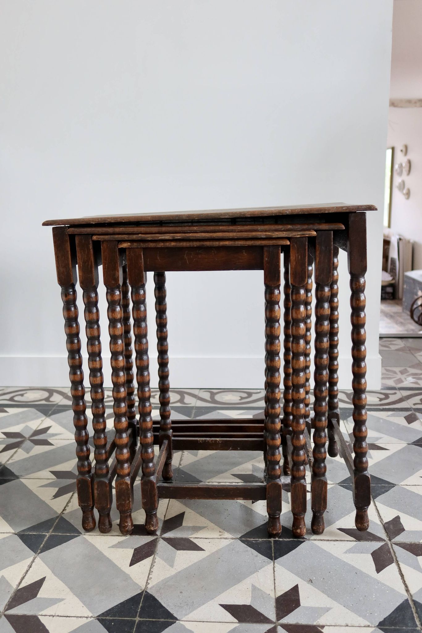 4 antique nesting tables made of turned wood