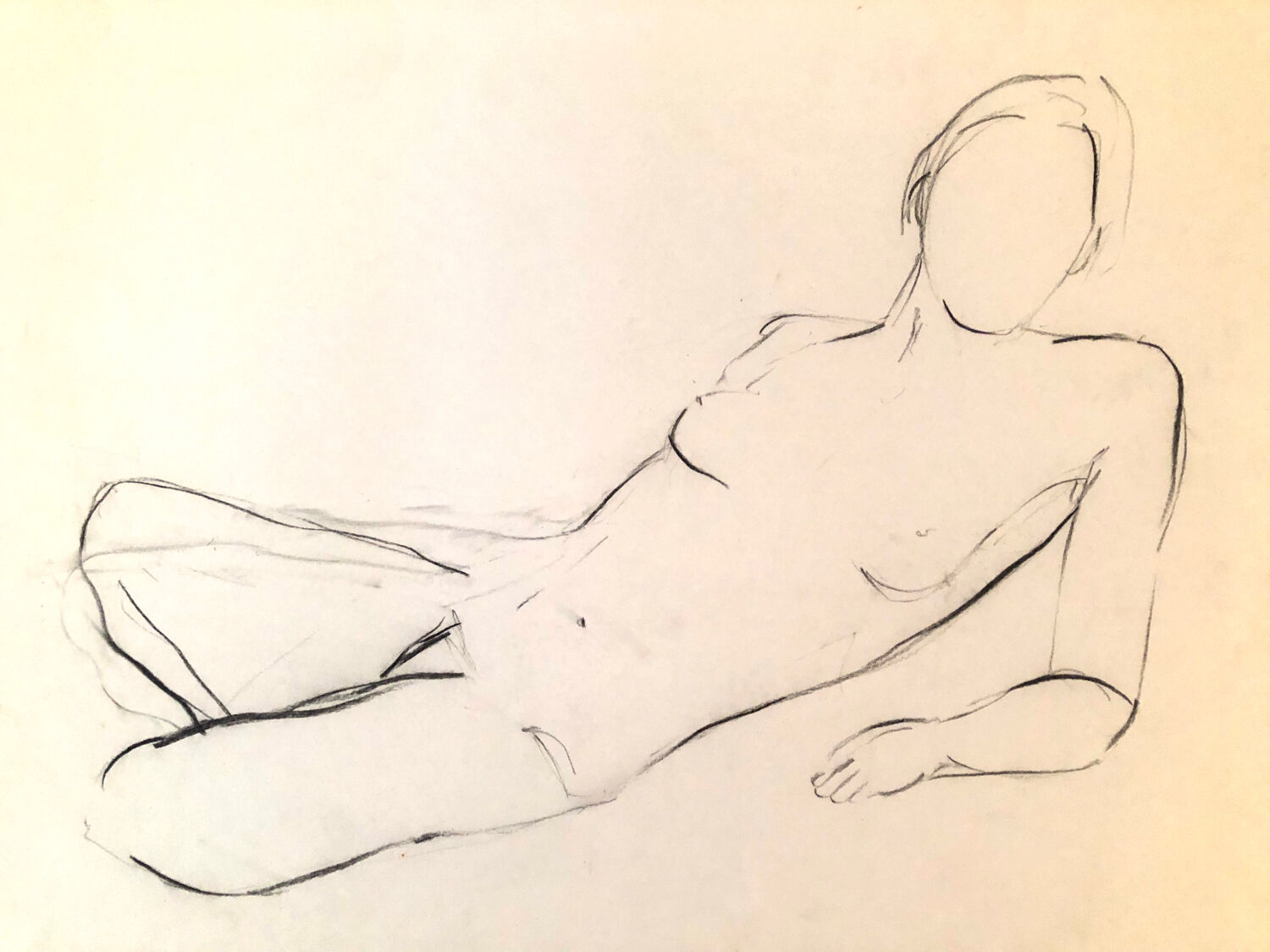 Drawing nude in charcoal on paper