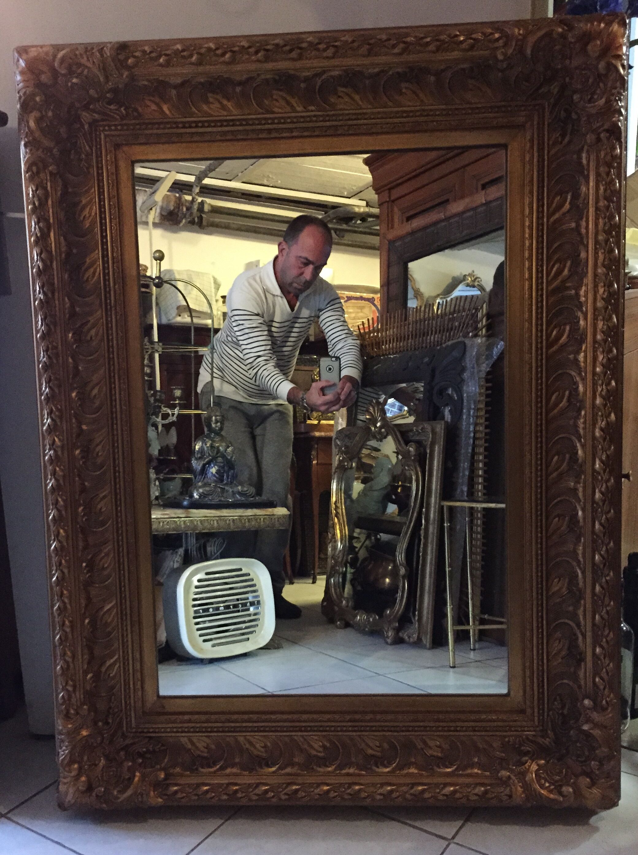 Miroir en bois doré 125 x 95 cm