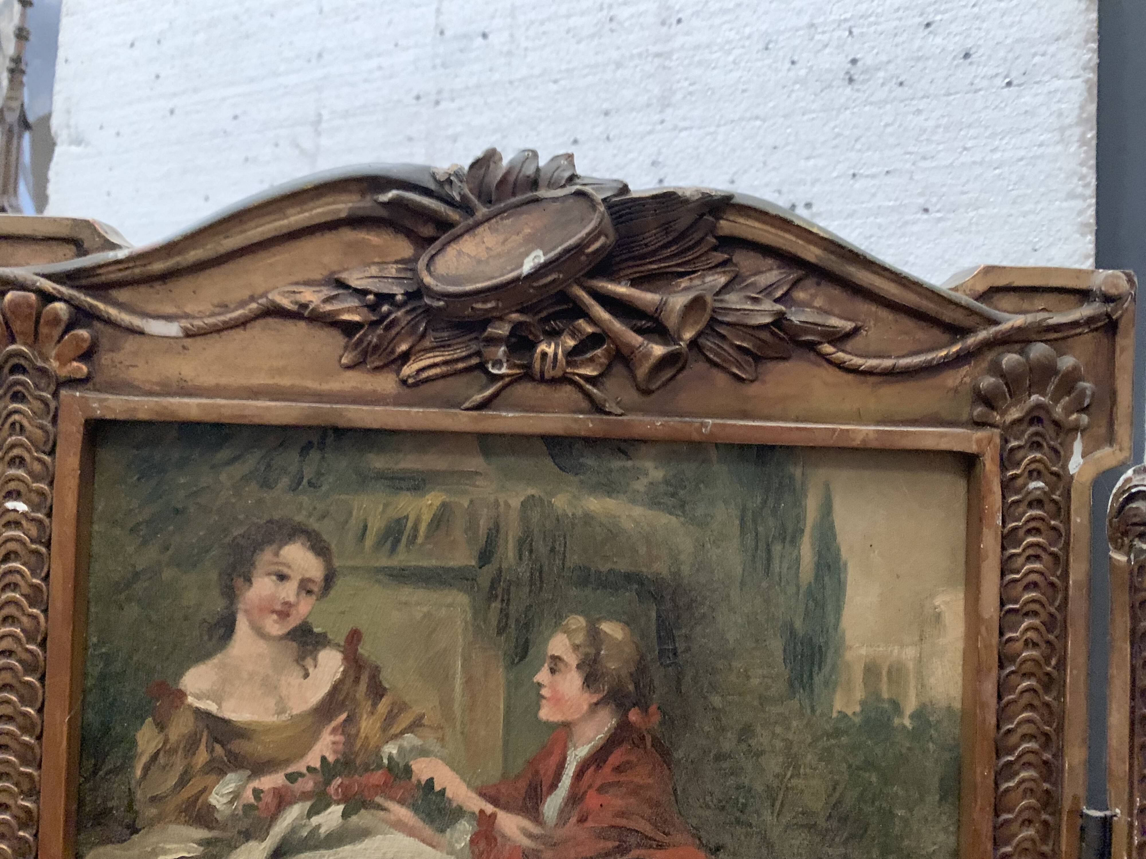 Paravent a trois panneaux de style Louis XVI en bois et stuc doré XX siècle