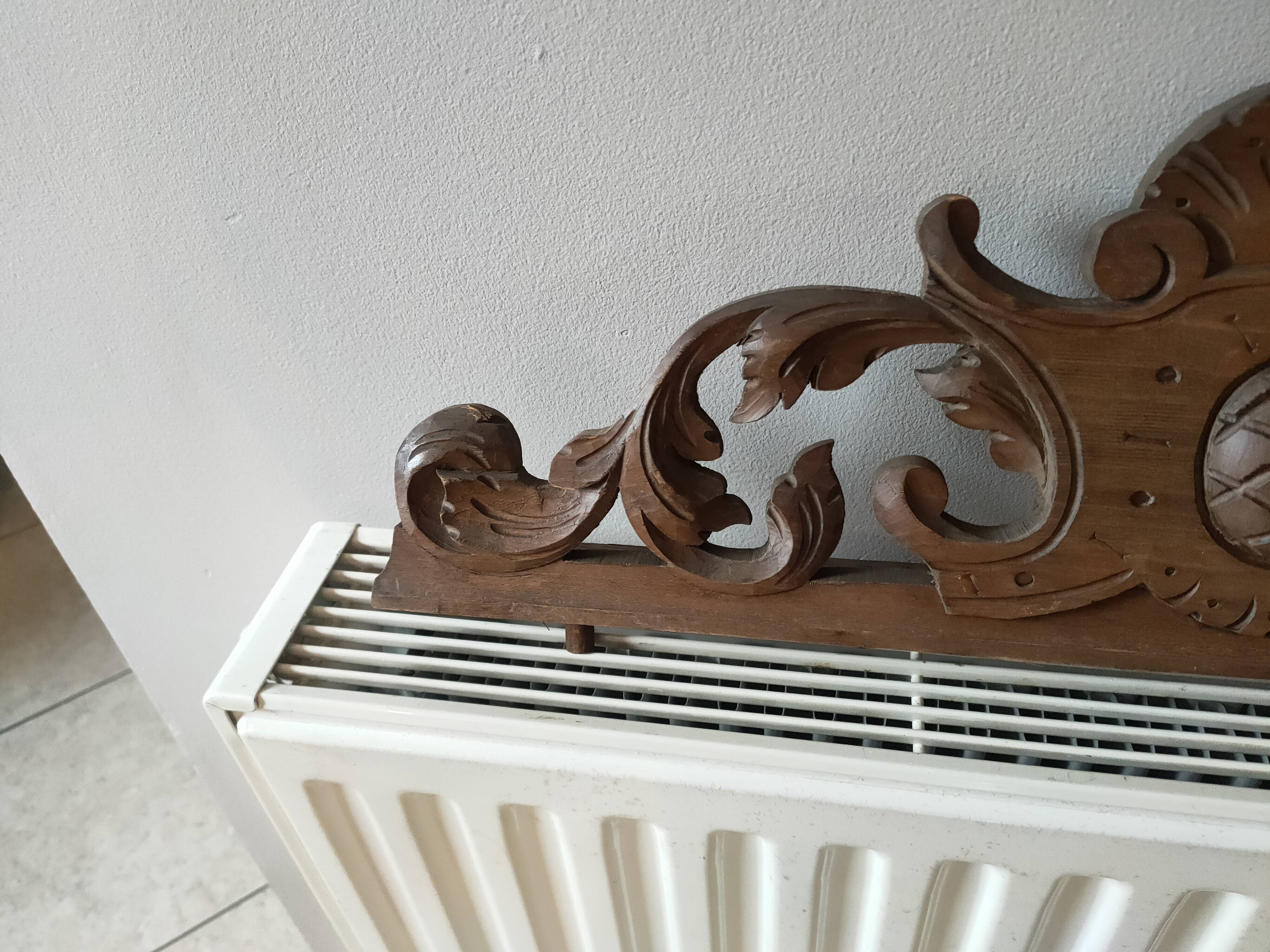 Old carved wooden pediment