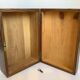 Old wooden box with handle and metal keys