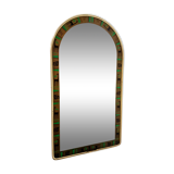 Mirror with a graphic decoration