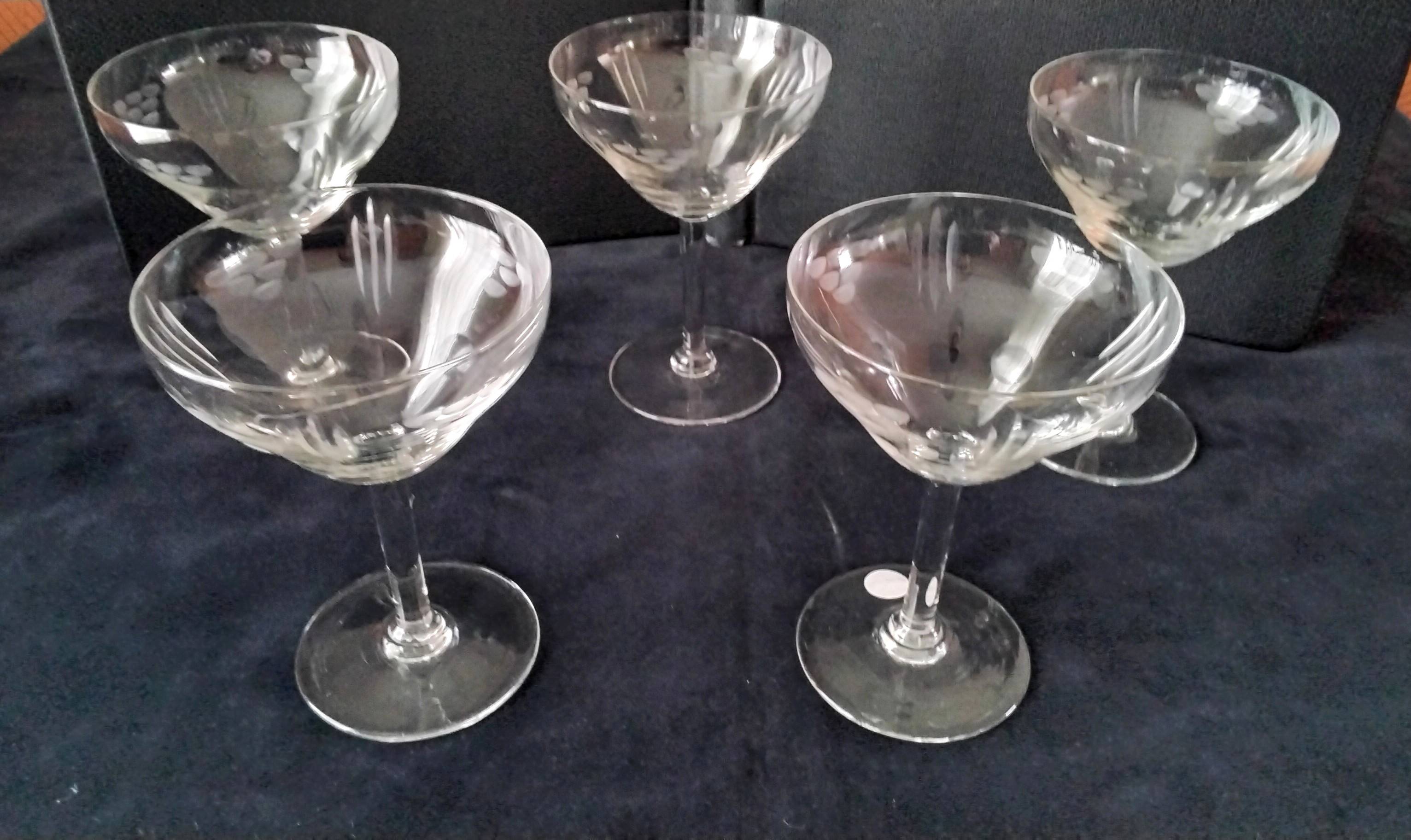 5 Vintage glass champagne coupes with engraved decoration