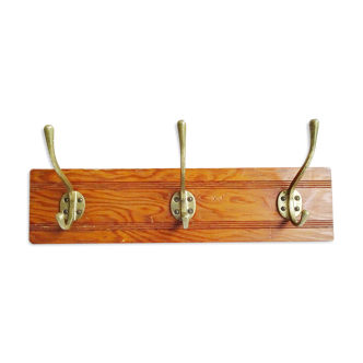 Hook rail made of wood and brass