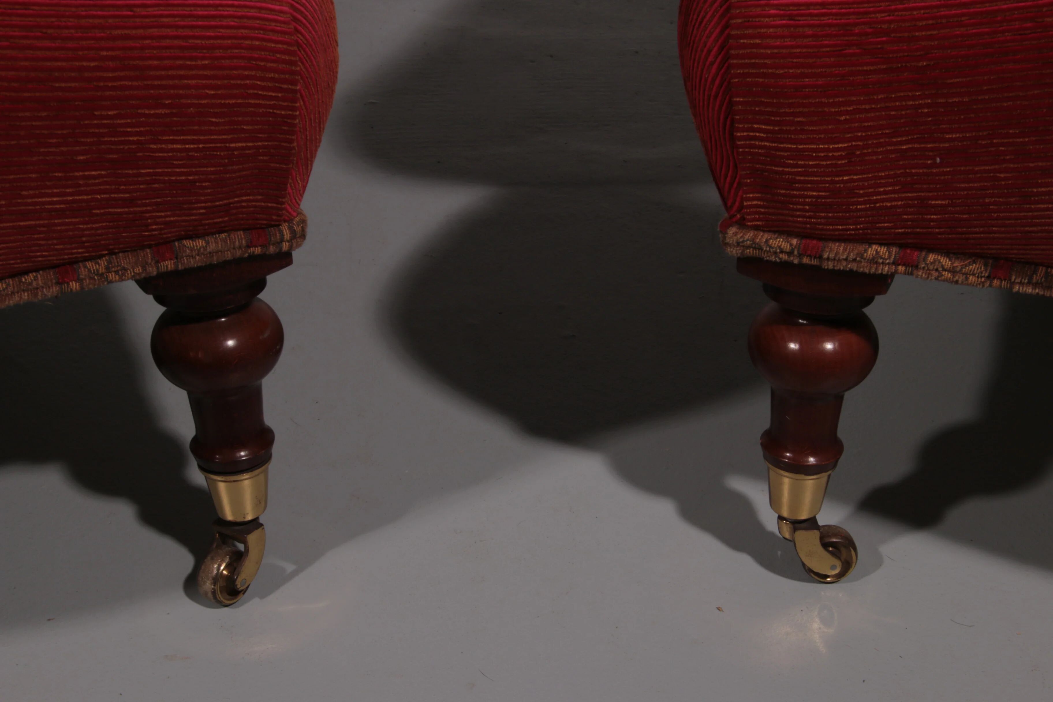 Pair of French red fabric button back armchairs
