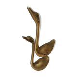 Golden brass swan duo