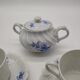 Haviland cup duo and its Limoges porcelain sugar bowl