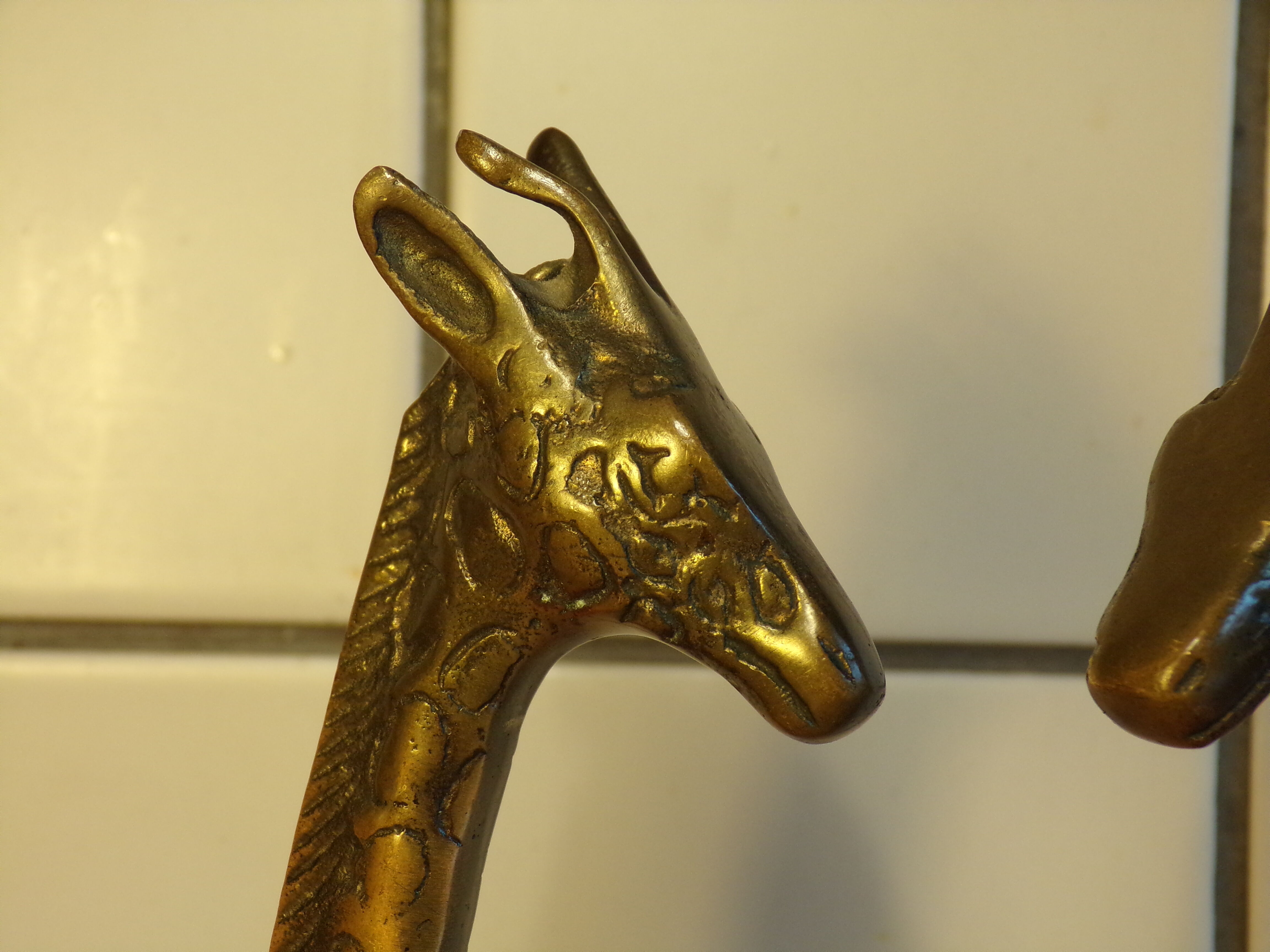 Pair of brass giraffes