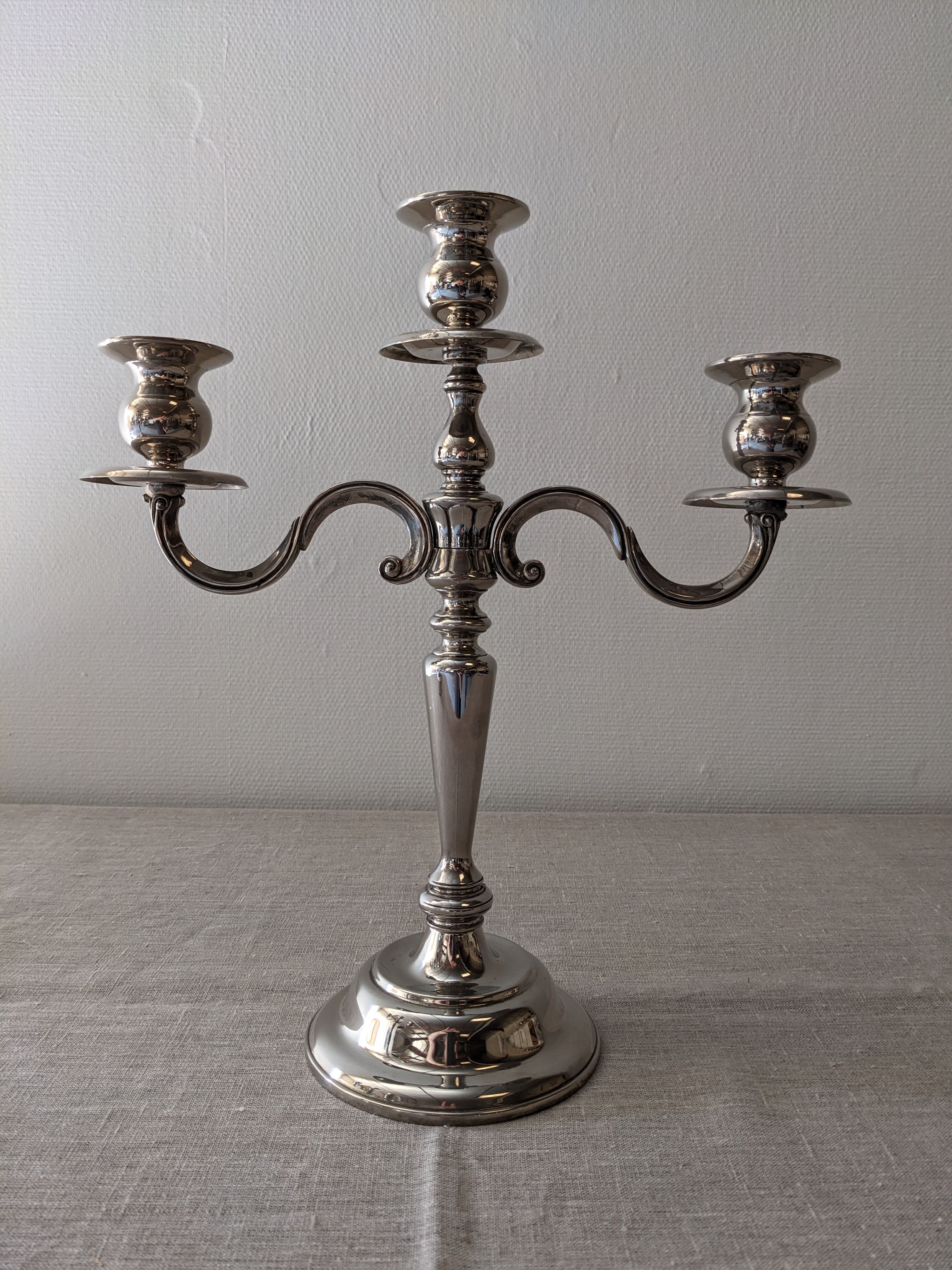 Pair of 3-light candlesticks in silver metal