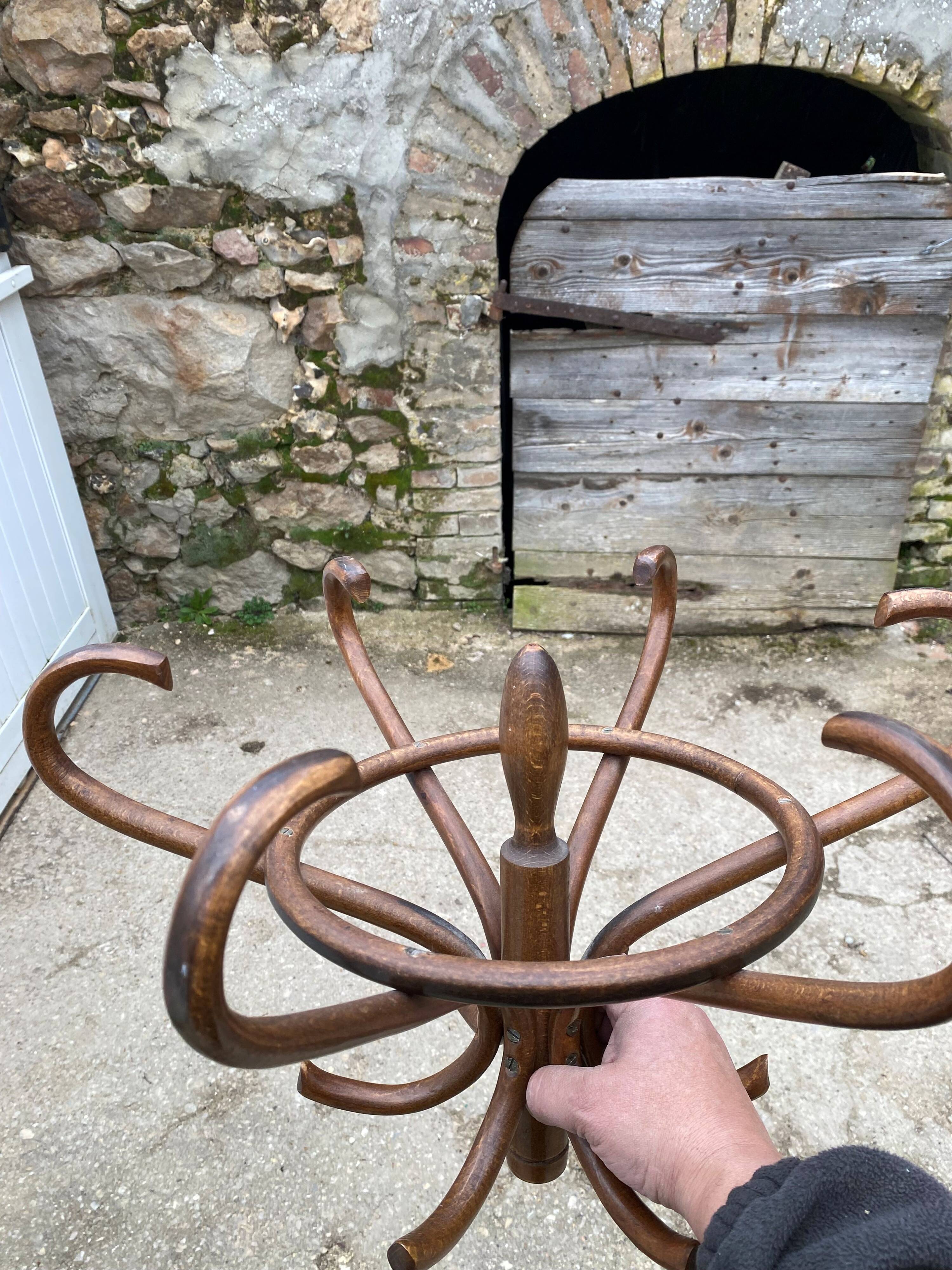 1960s bistro swivel parrot coat rack, curved wood