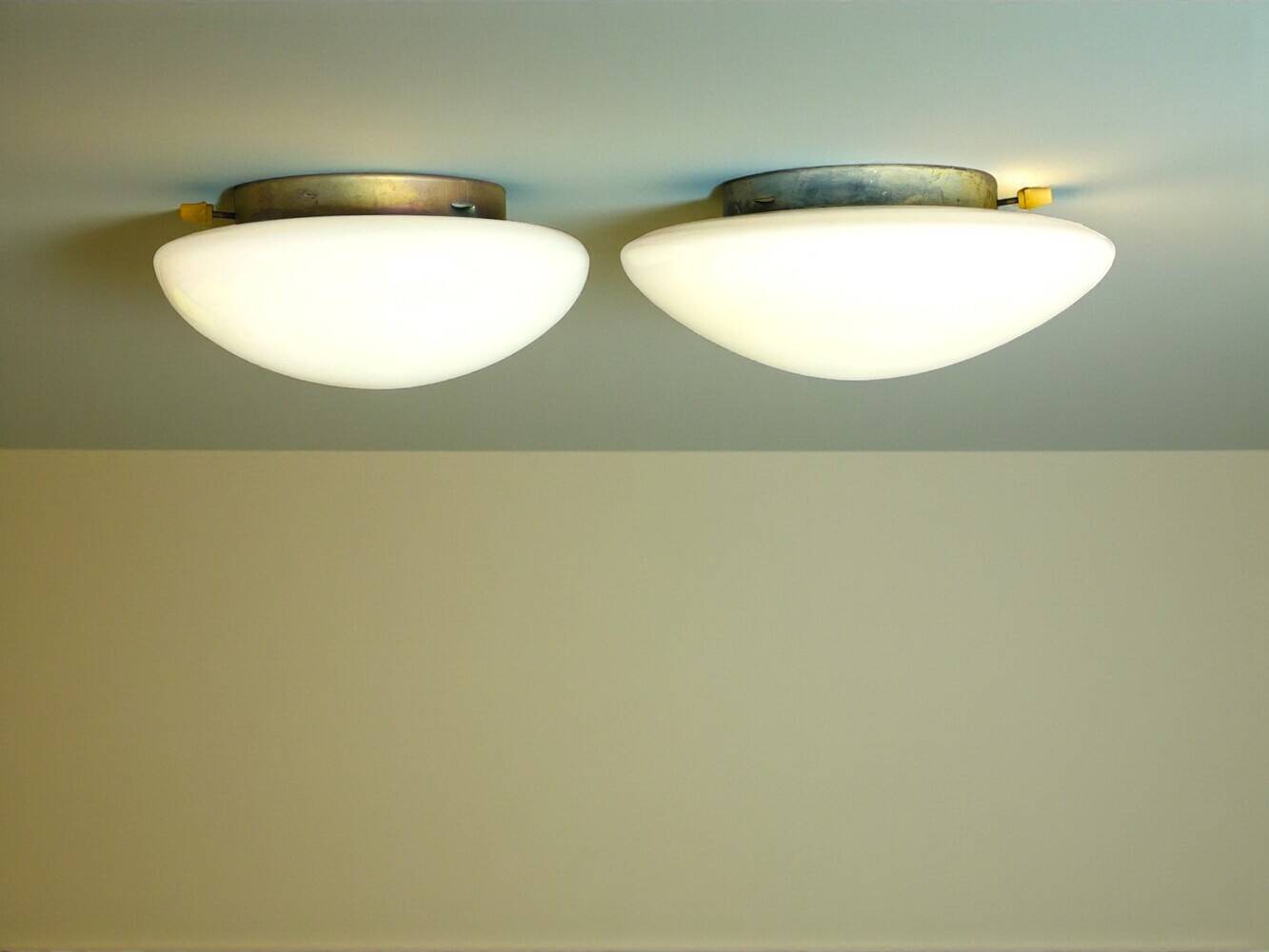 Pair Art Deco white glass wall or ceiling lamps