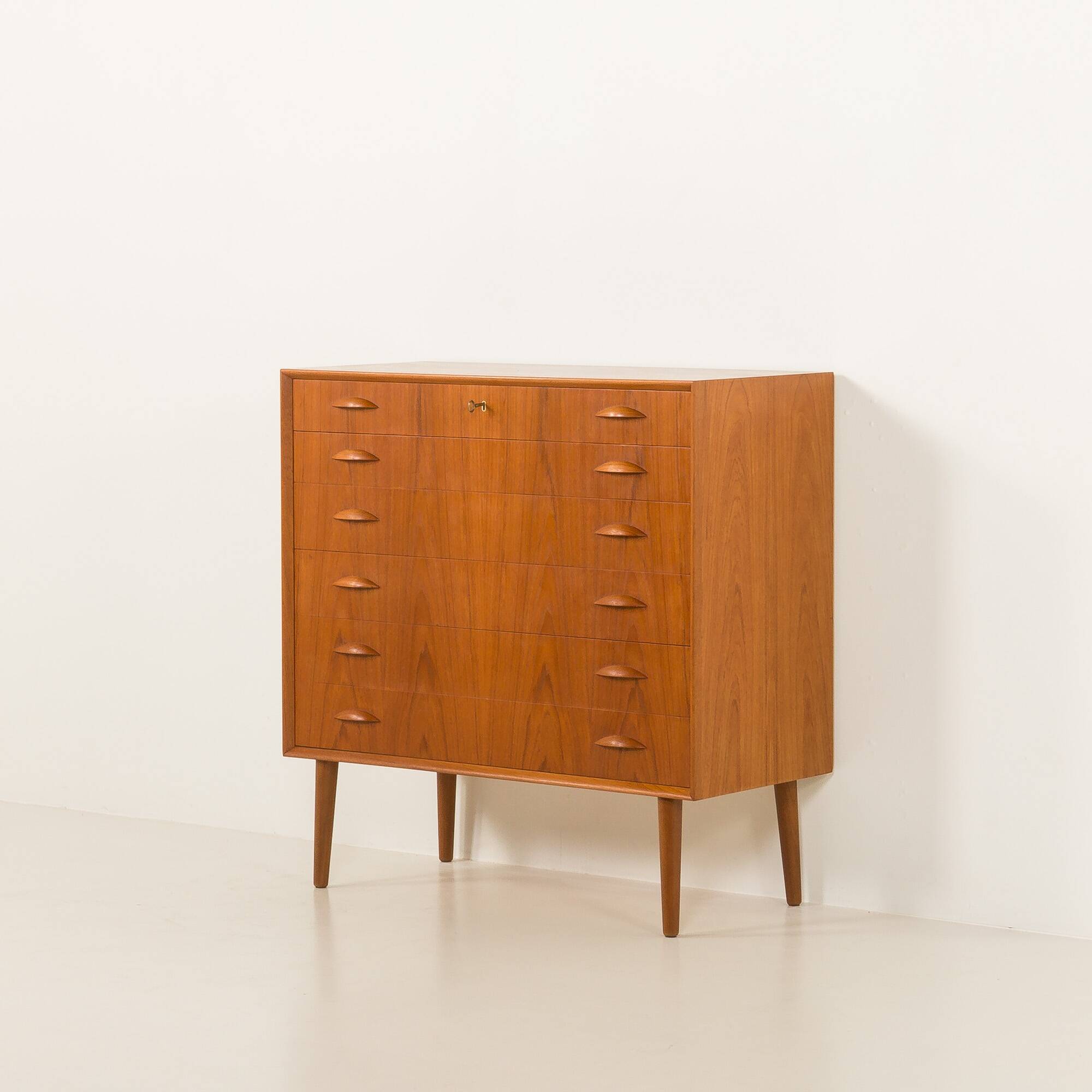 Scandinavian teak chest of drawers by Johannes Sorth for Nexo Mobelfabrik.