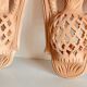 Pair of terracotta wall candle holders