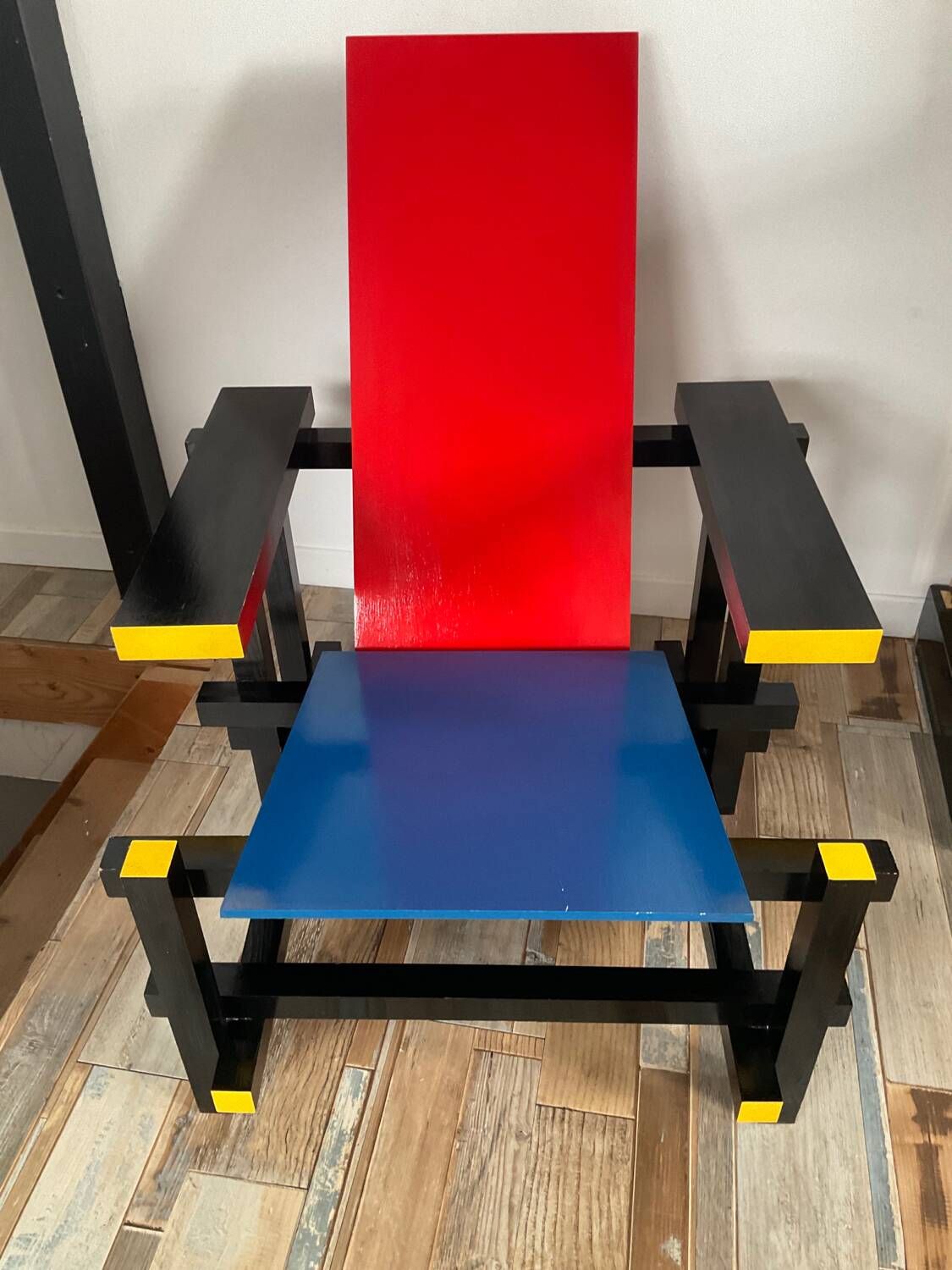 “Red and blue” lounge chair in the style of Gerrit Rietveld