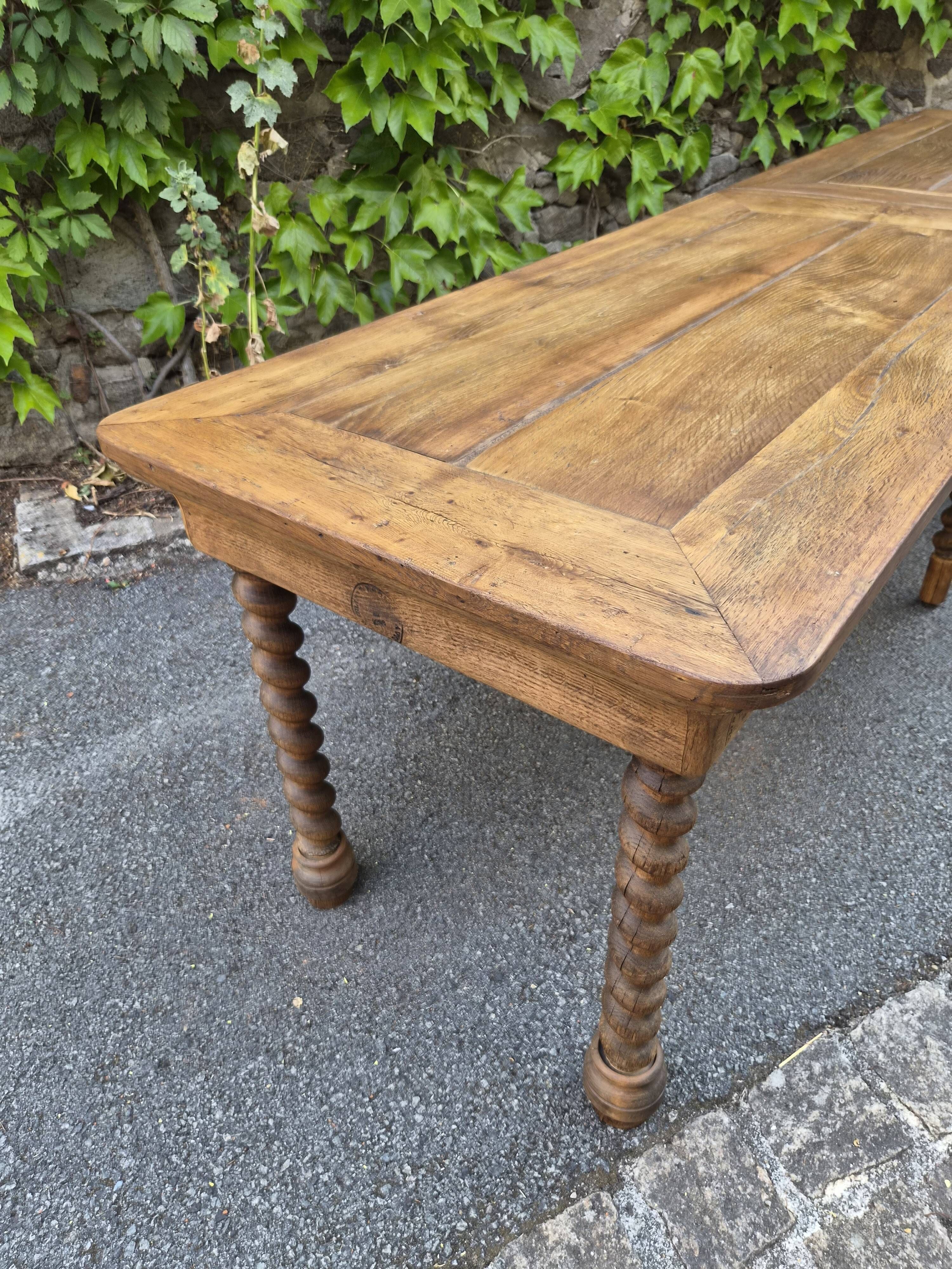 Antique French draper's table in oak, shop counter, work table, 6 feet, circa 1750–1850.