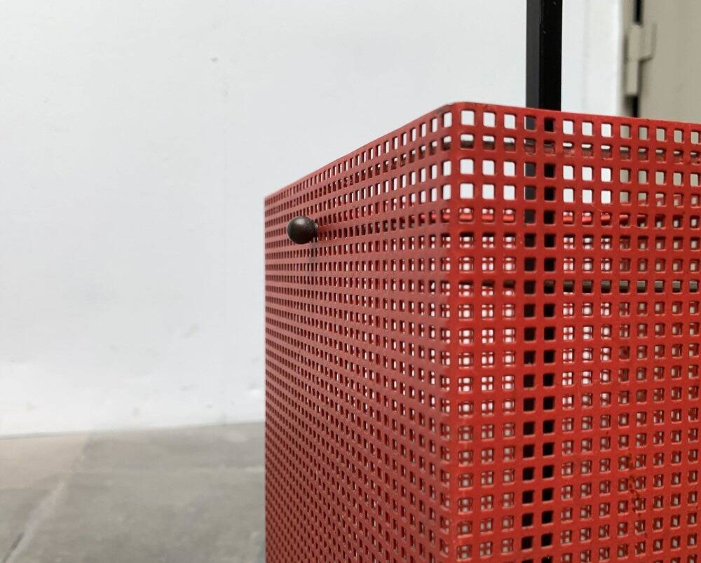 Minimalist perforated steel umbrella stand, 1960s