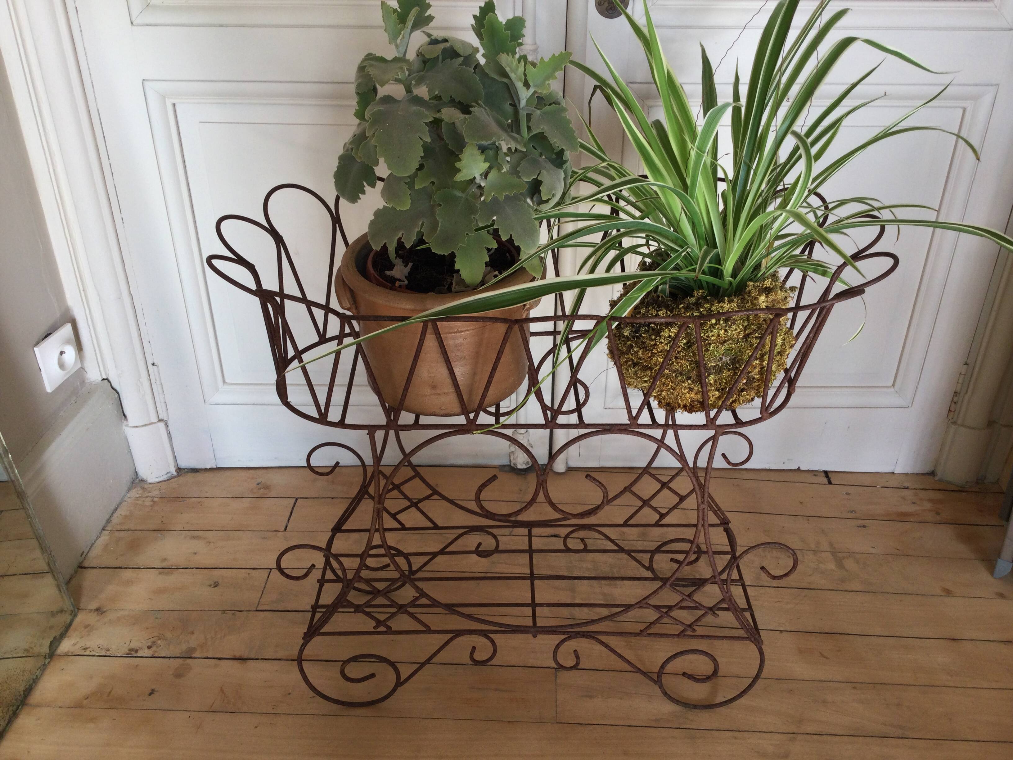 Antique iron plant stand