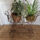Antique iron plant stand