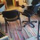 Two black leather armchairs