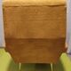 Old velvet heating chair on metal legs