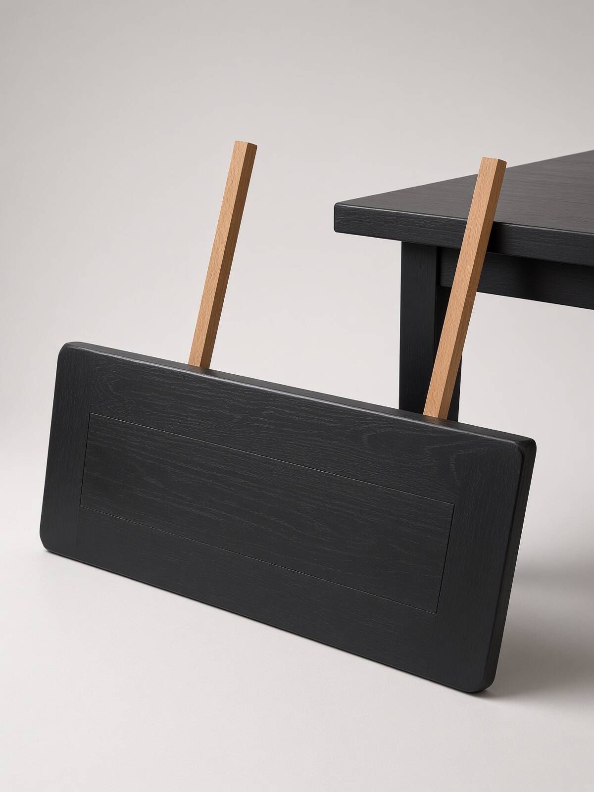 Wooden table with a black patina and two extensions – 180 to 260 cm