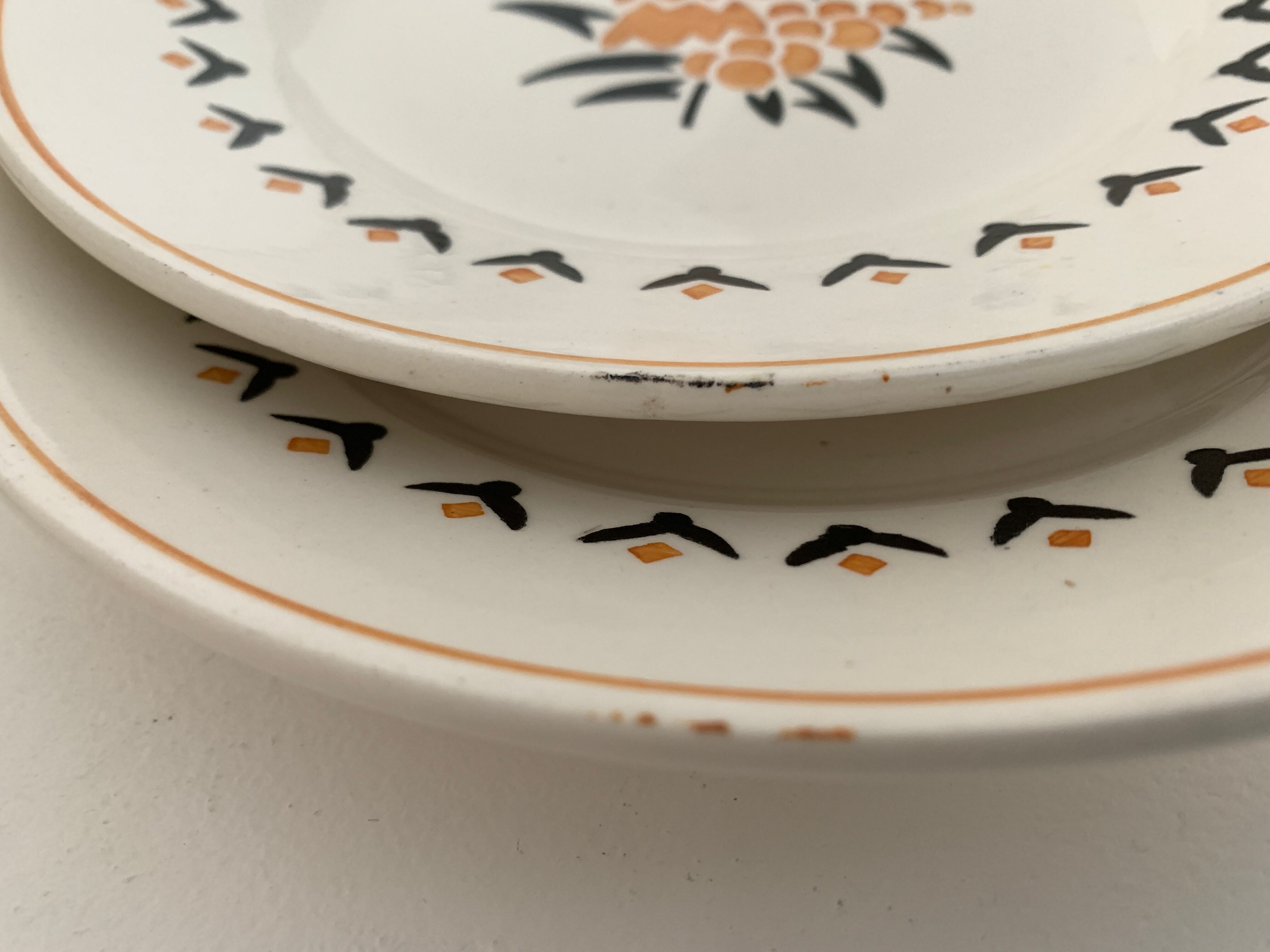7 dessert plates and one Longwy dish