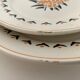 7 dessert plates and one Longwy dish