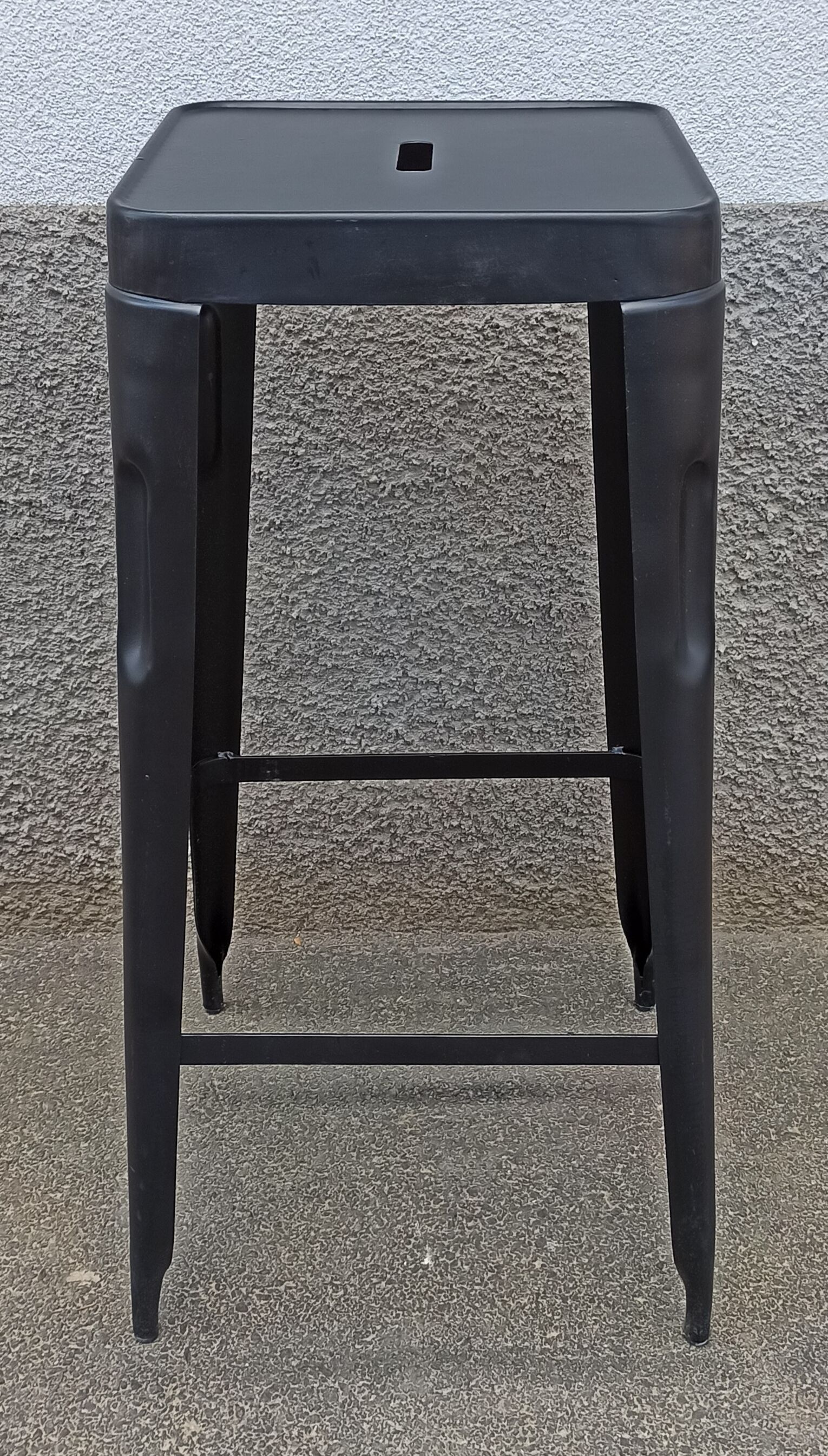 Pair of black metal stools