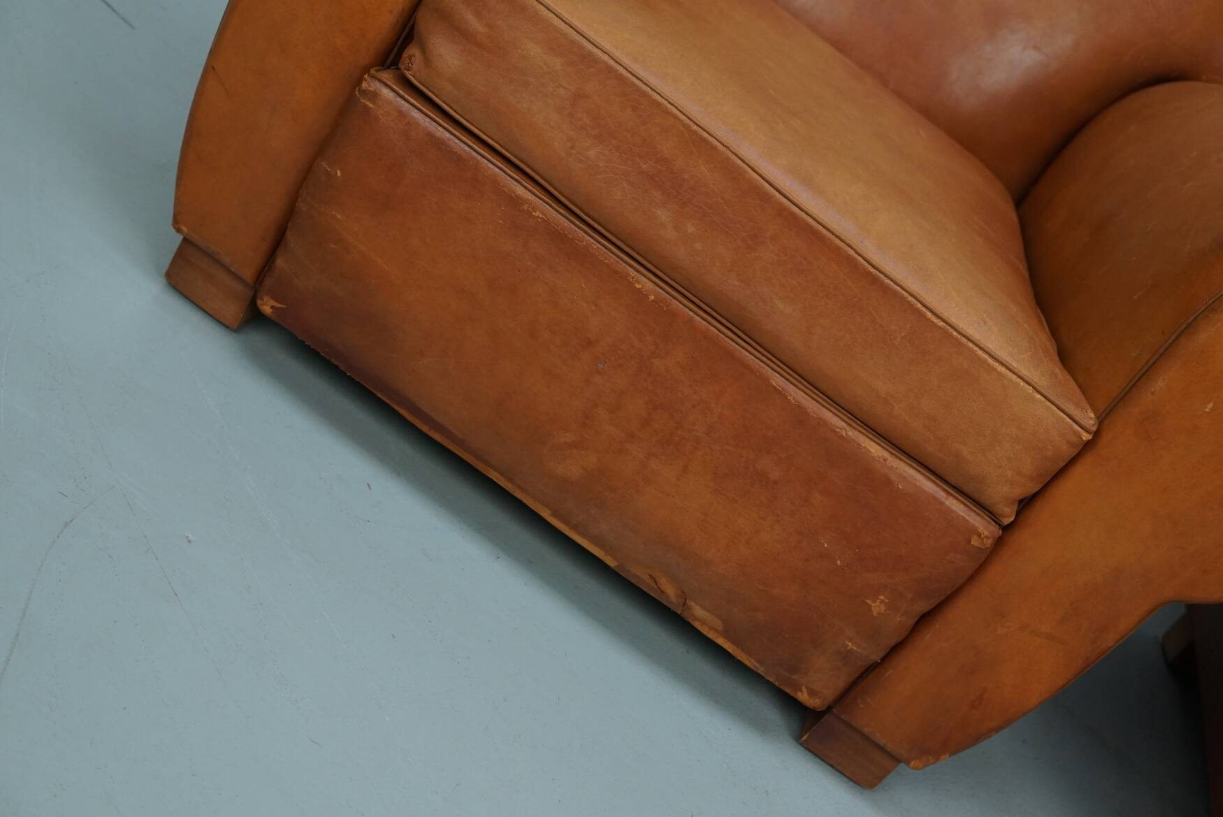 Pair of French club chairs with moustache back in cognac leather, 1950s