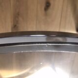 Round coffee table in chrome metal and smoked glass